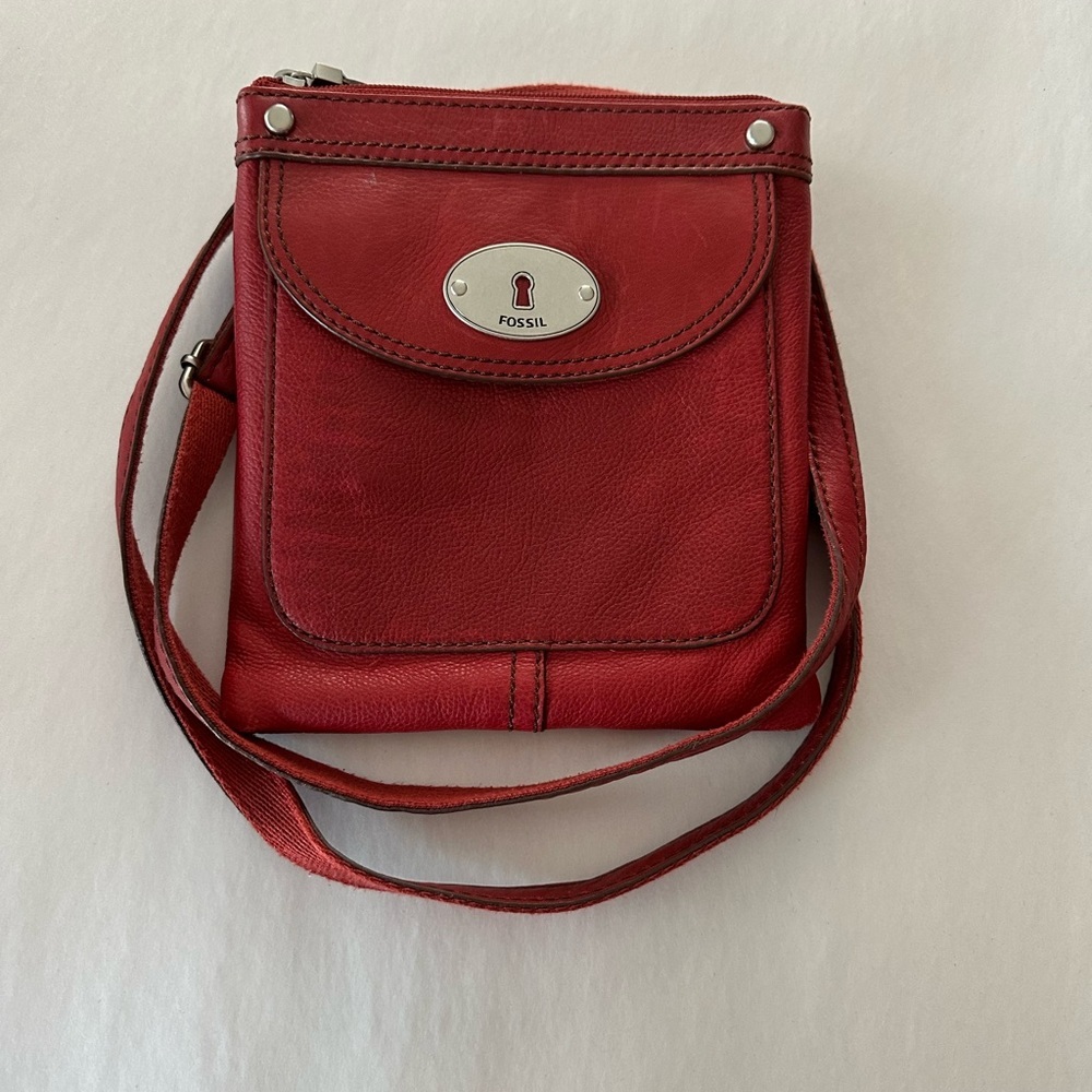 Fossil leather Redish Burgundy crossbody purse.